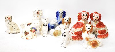 Lot 219 - Ten various ceramic ornaments of cats and dogs,...