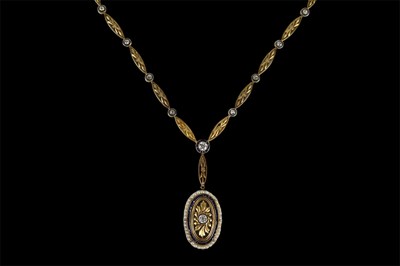 Lot 319 - An 18ct yellow gold diamond and sapphire set...