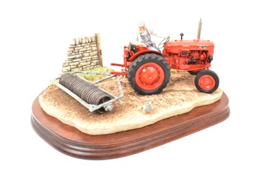 Lot 315 - BORDER FINE ARTS; a tractor figure group,...