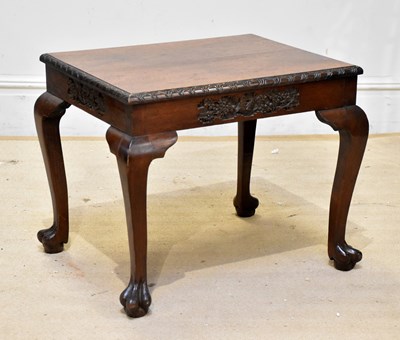 Lot 1842 - A Chinese hardwood carved coffee table, with...