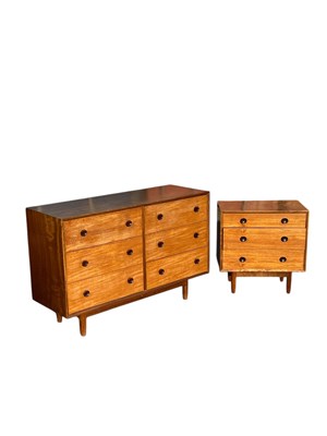 Lot 2012 - A mid century teak chest of six drawers, on...