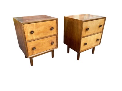 Lot 2015 - A pair of mid century teak bedside chests of...