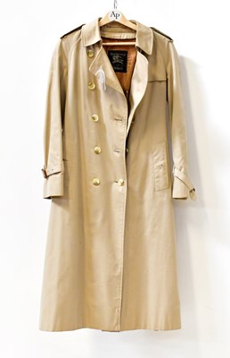 Lot 622 - BURBERRY; a raincoat with satin lining and...