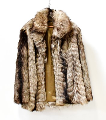 Lot 624 - A goatskin jacket, with wide lapel and satin...
