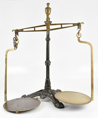 Lot 2439 - AGATE BALANCE; a cast iron and brass set of...