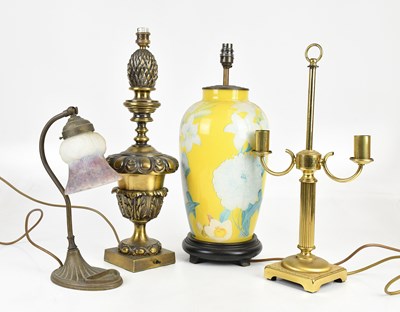 Lot 2420 - A collection of four lamps including two brass...