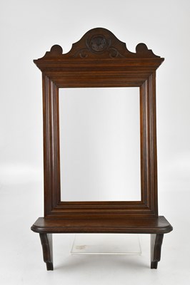 Lot 2299 - A 19th century walnut mirrored wall shelf, 76...
