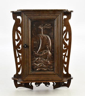 Lot 2328 - An Arts and Crafts hanging cabinet, with...