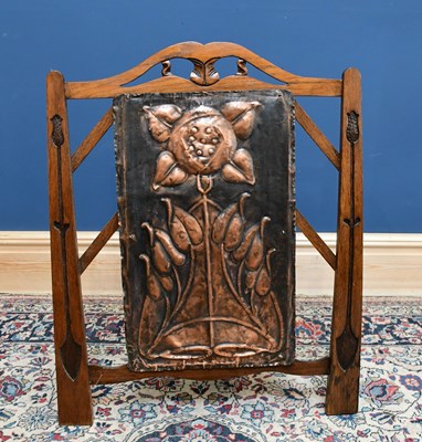 Lot 1448 - An Arts and Crafts style embossed copper and...