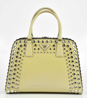 Lot 629 - PRADA; a cream and black Saffiano calfskin...