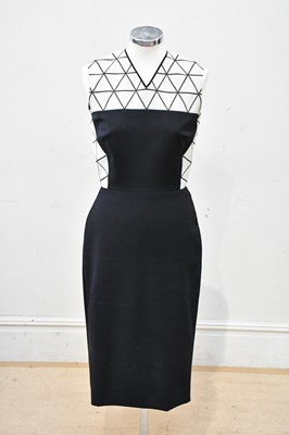Lot 730 - VICTORIA BECKHAM; a black cotton midi length...
