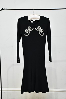 Lot 731 - FENDI; a black mid length knitted midi dress,...