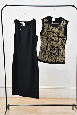 Lot 779 - MICHAEL KORS; a little black midi length short...