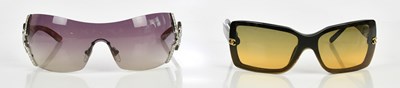 Lot 687 - CHANEL; a pair of brown acetate square shaped...
