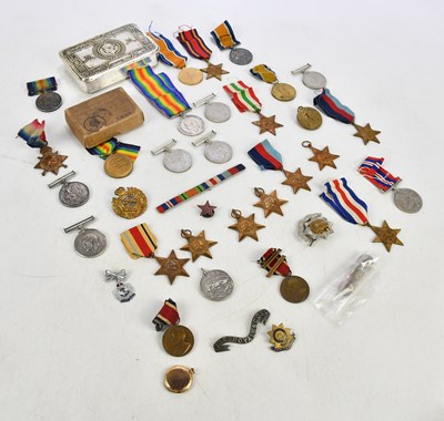 Lot 2451 - A collection of WWI and WWII medals including...