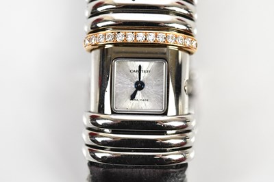 Lot 560 - CARTIER; a Declaration watch, set with...