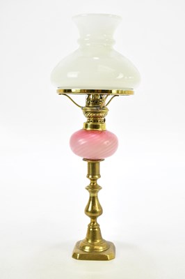 Lot 2419 - A 19th century peg lamp, with pink glass...