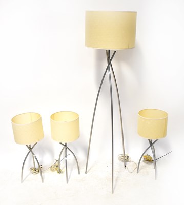 Lot 145 - Three table lamps with tripod tubular metal...