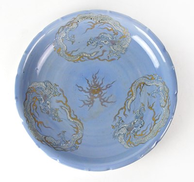 Lot 268 - A Chinese porcelain charger of pale blue...