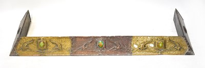 Lot 85 - An Art Nouveau brass and copper fender, with...