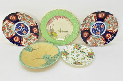 Lot 244 - Five decorative wall plates, comprising a near...