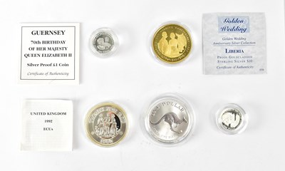 Lot 990 - Five silver proof coins, comprising a Liberia...
