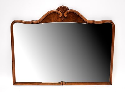 Lot 114 - A 20th century walnut framed wall mirror, with...
