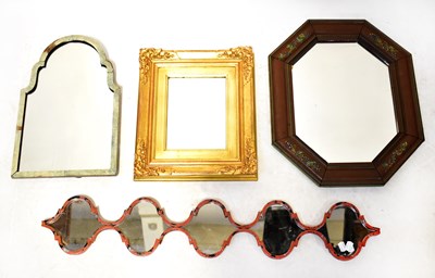 Lot 119 - Four wall mirrors comprising a Moroccan-style...