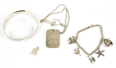 Lot 1595 - A hallmarked silver ingot produced to...