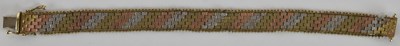 Lot 1593 - A 9ct gold three colour woven mesh bracelet,...