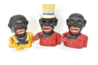 Lot 334 - Three vintage cast iron 'Jolly' figure money...