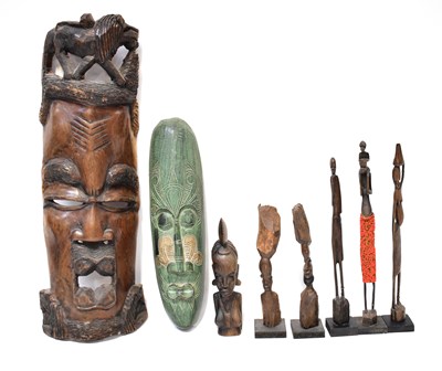 Lot 351 - A large carved wooden African mask, the head...