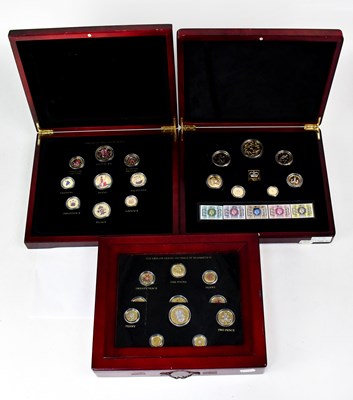 Lot 1001 - Three cased gold-plated United Kingdom coin...