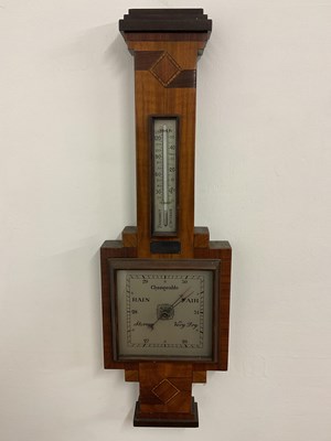 Lot 124 - An early 20th century aneroid wall barometer,...