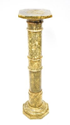 Lot 122 - An Italian alabaster jardinière stand in the...