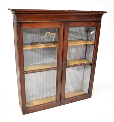 Lot 65 - A mid-20th century teak floorstanding...