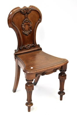 Lot 26 - A 19th century mahogany hall chair, with...