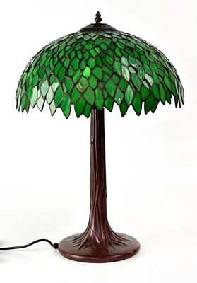 Lot 136 - A Tiffany-style table lamp with green shade,...