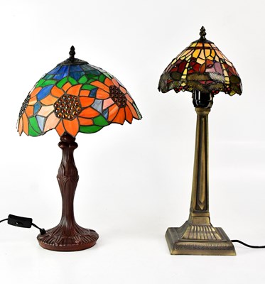 Lot 137 - Two Tiffany-style table lamps, one with...