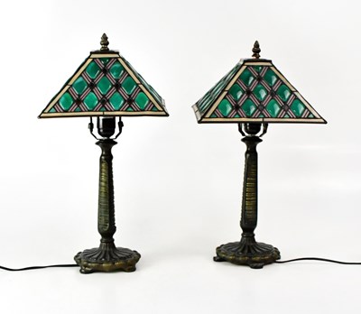 Lot 139 - A near pair of Tiffany-style table lamps with...