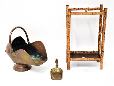 Lot 72 - A copper helmet-shaped coal scuttle with...