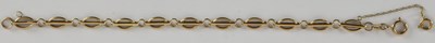 Lot 1611 - A 9ct gold bracelet, with line and oval open...