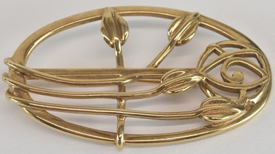 Lot 1543 - A large oval 9ct gold brooch after a design by...