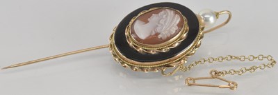 Lot 1544 - A late 19th/early 20th century 9ct gold lapel...