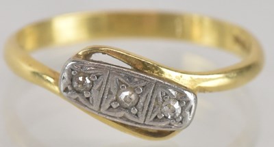 Lot 1281 - An 18ct gold ring, the table with three tiny...