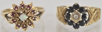 Lot 1299 - Two 9ct gold floral cluster rings, one in the...