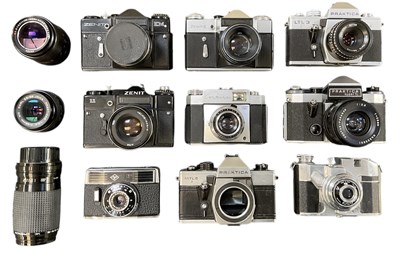 Lot 431 - A quantity of cameras and lenses including...