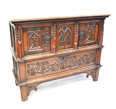 Lot 110 - A reproduction oak Dutch-style carved court...