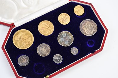 Lot 1523 - A George V 1911 gold and silver specimen coin...