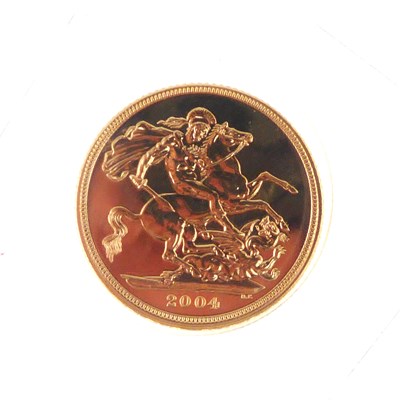 Lot 943 - An Elizabeth II 2004 sovereign, George &...